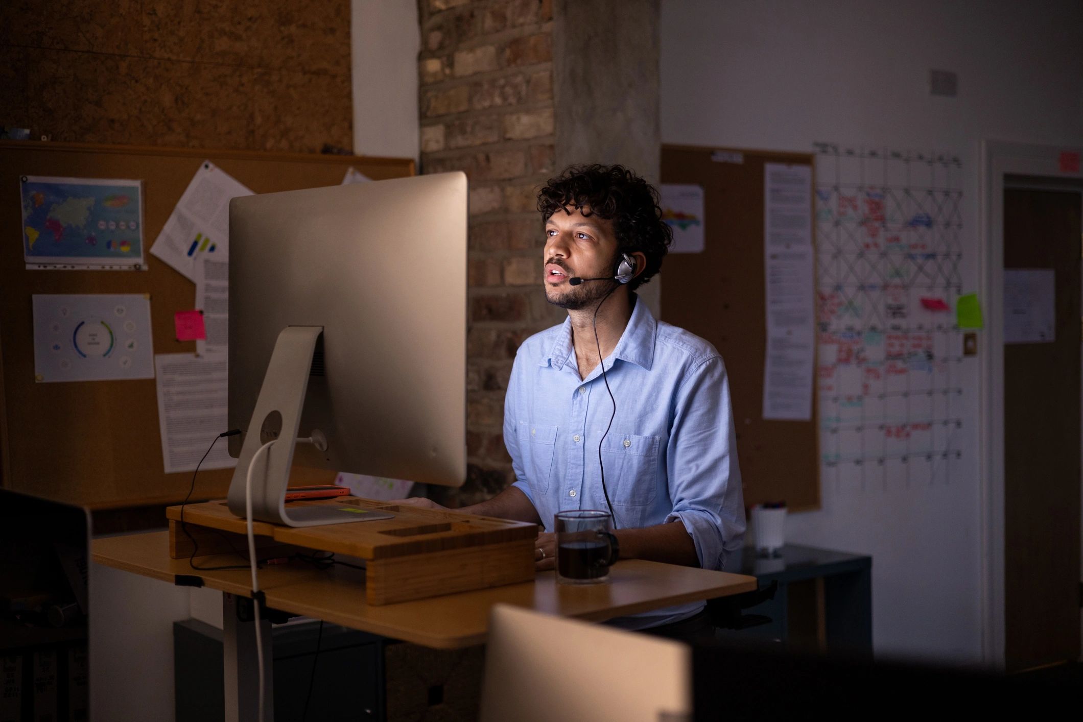 Transportation support professional working at a dispatch desk