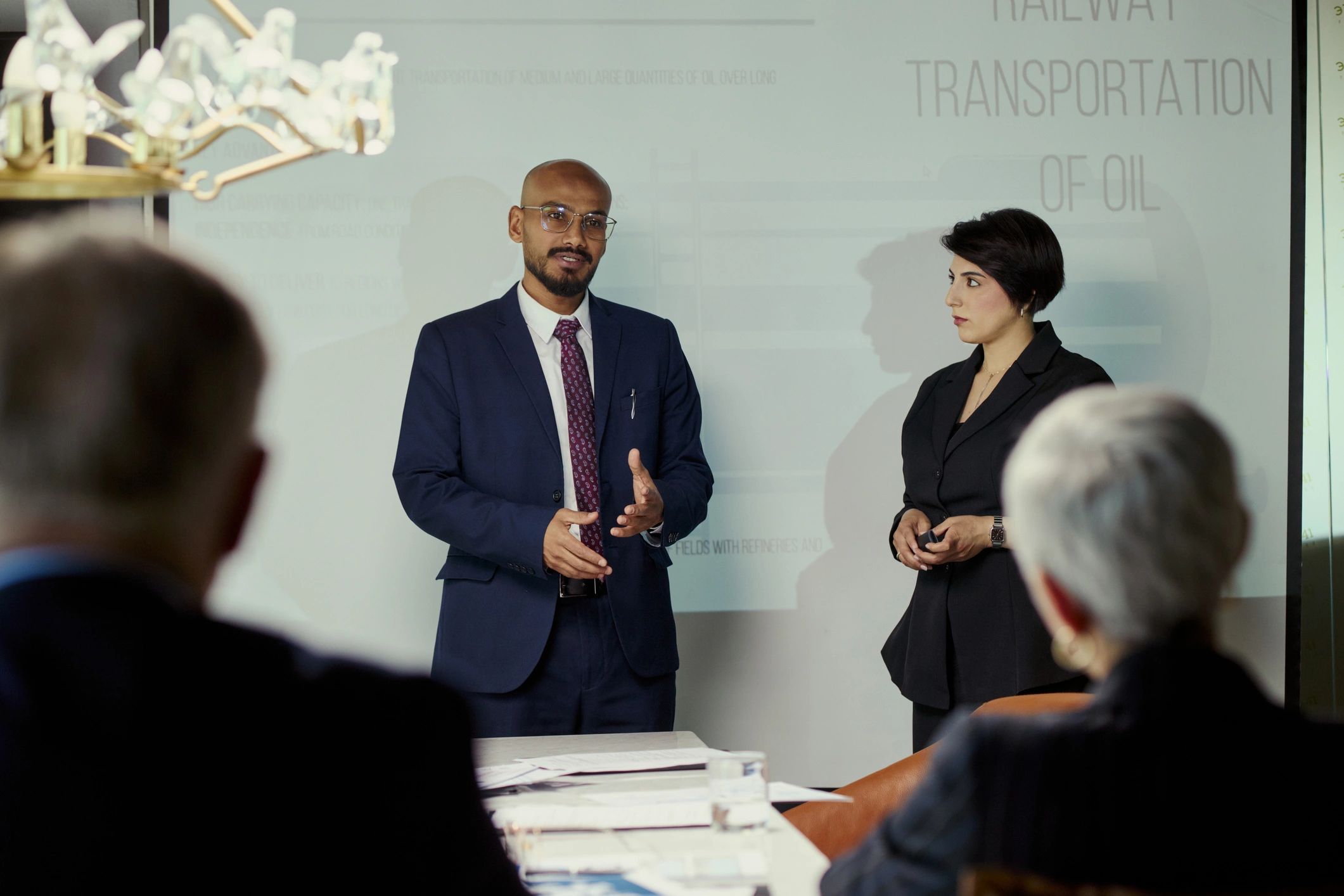 Transportation planning meeting with paperwork and strategy discussion